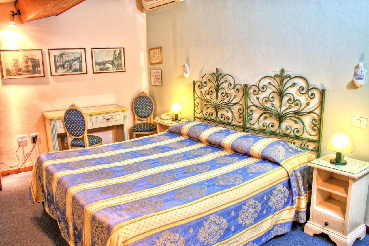 Hotel Torcolo "Residenze Del Cuore" Verona Bagian luar foto