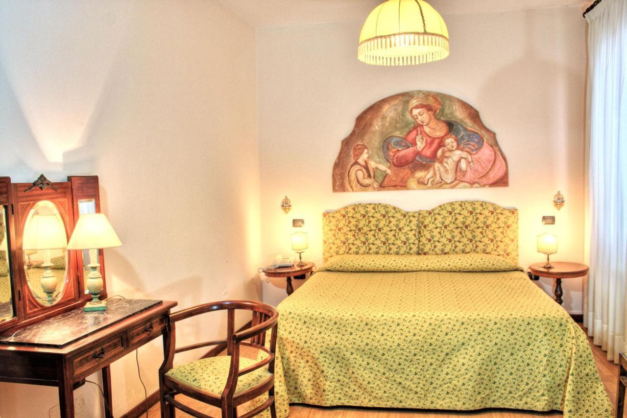 Hotel Torcolo "Residenze Del Cuore" Verona Bagian luar foto