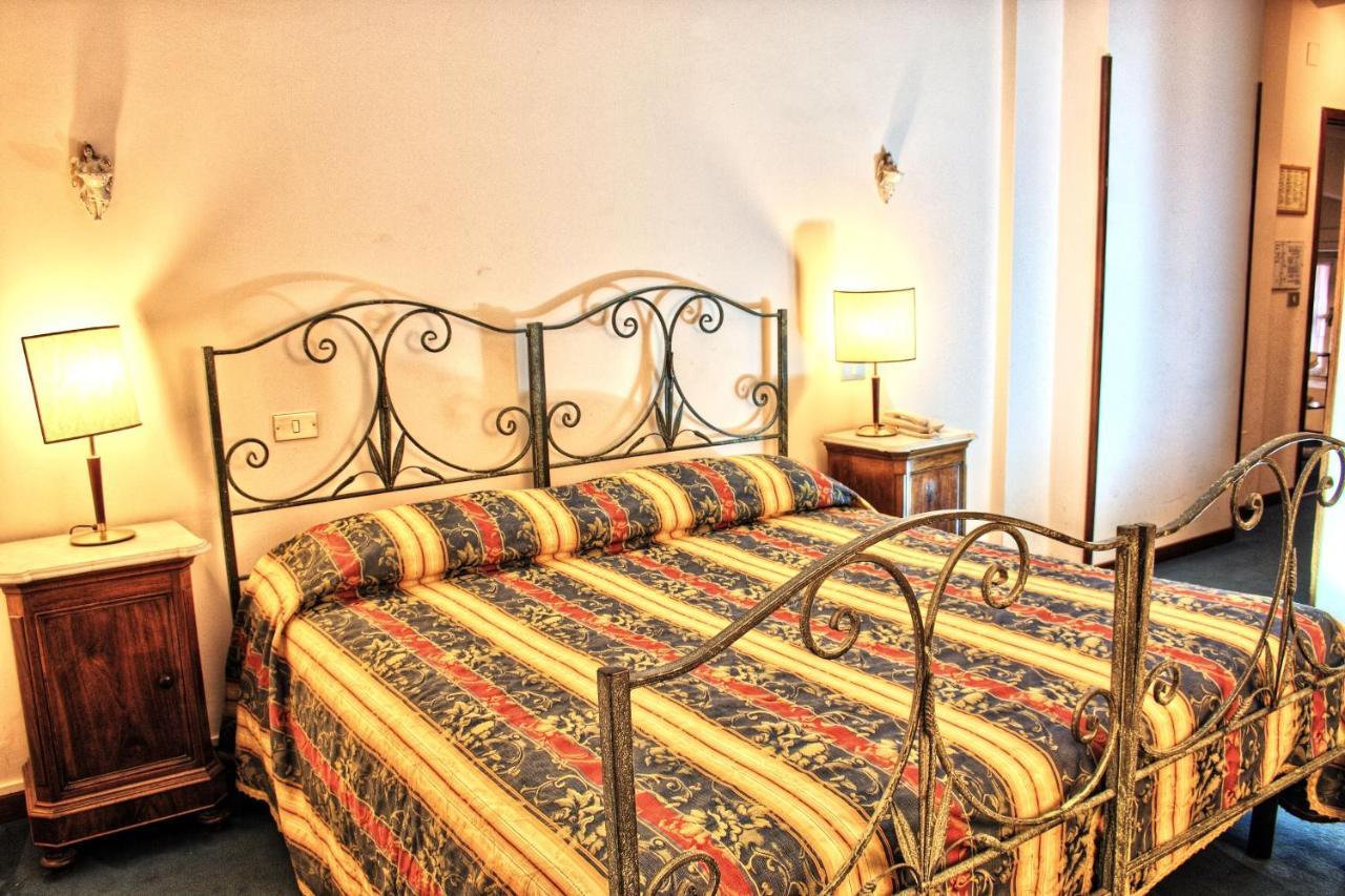 Hotel Torcolo "Residenze Del Cuore" Verona Bagian luar foto